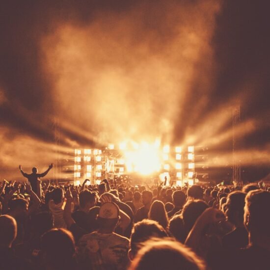 Worship concert crowd under bright stage lights — CeCe Winans Goodness of God lyrics guide